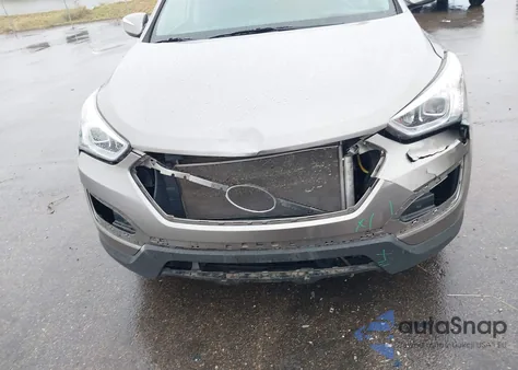 2014 Hyundai Santa Fe Sport 2.4L z USA, uszkodzony, nr VIN 5XYZUDLB9EG209397